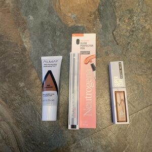 3 brand new mixed makeups. Med-dark shades